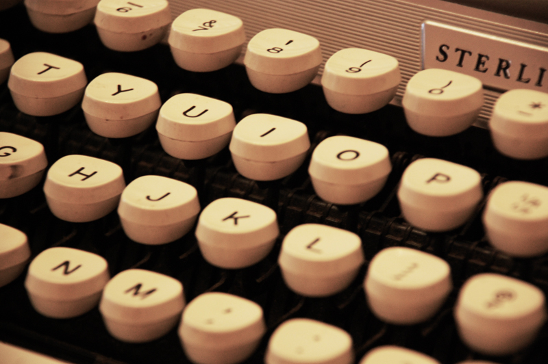 Close up color photo of vintage typewriter keys