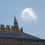Death Star in blue sky above a building in Copenhagen