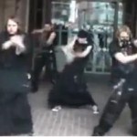 Teenagers in black dancing