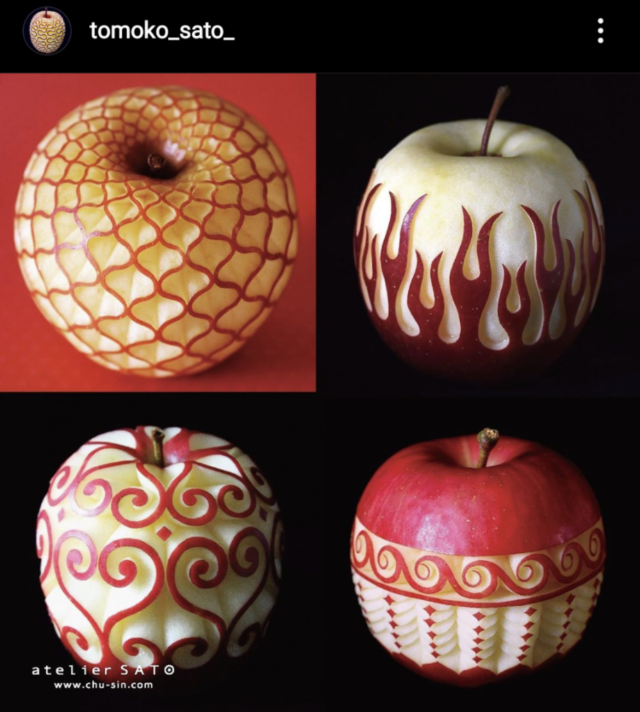 Four apple carvings by Tomoko Sato